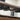 Discreet remote control holder for under-desk mounting