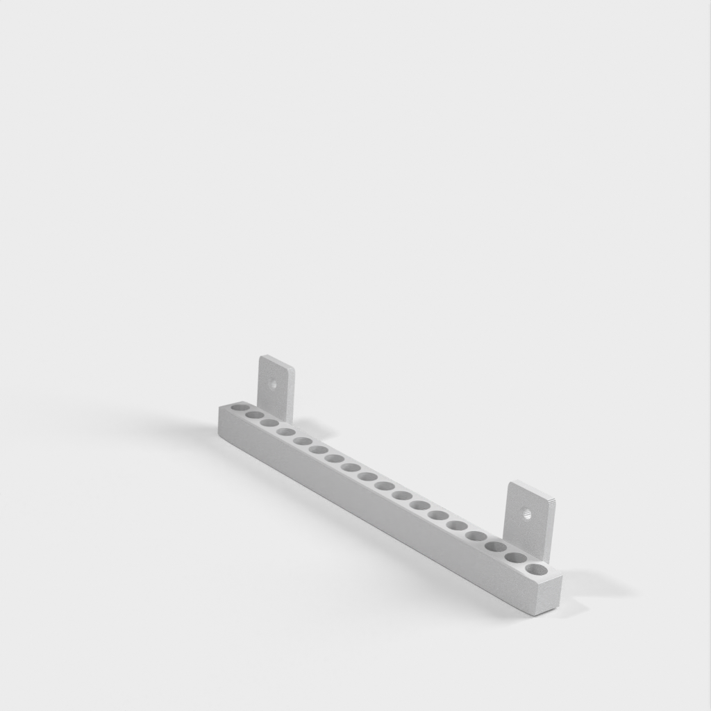 Wall-mounted screwdriver bit holder with 8mm holes