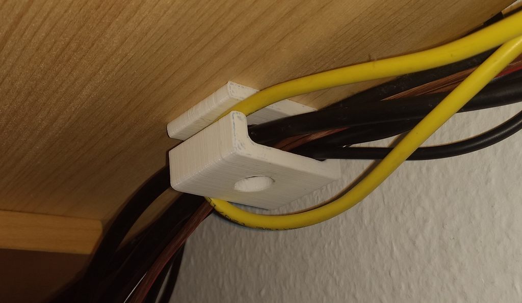 Cable management clips with and without screw holes for organised wiring
