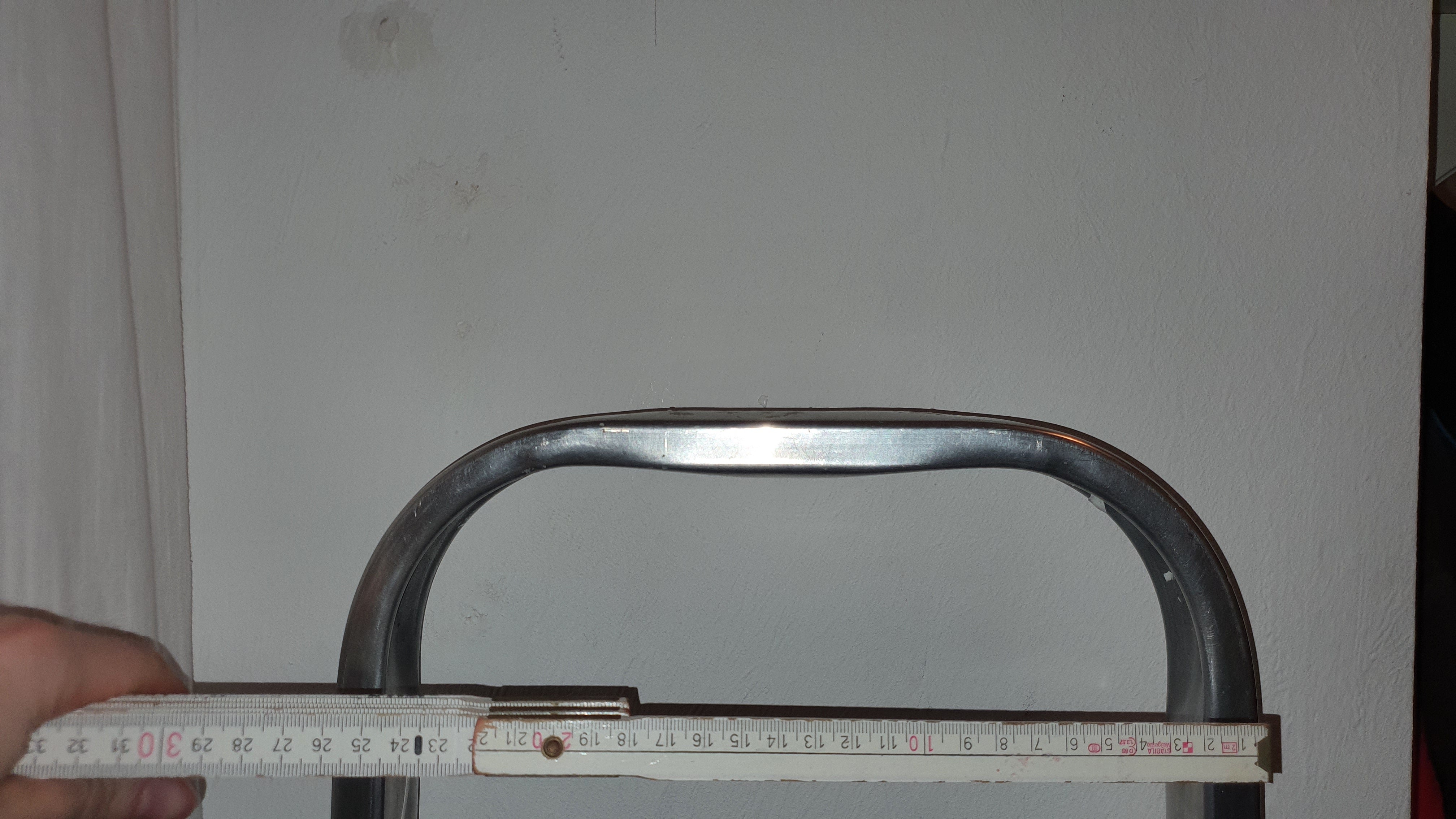 Wall hook for ladder