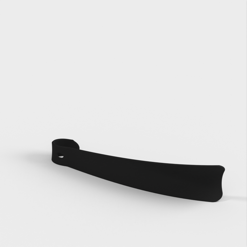 Large unsupported shoe horn with angled end for hanging