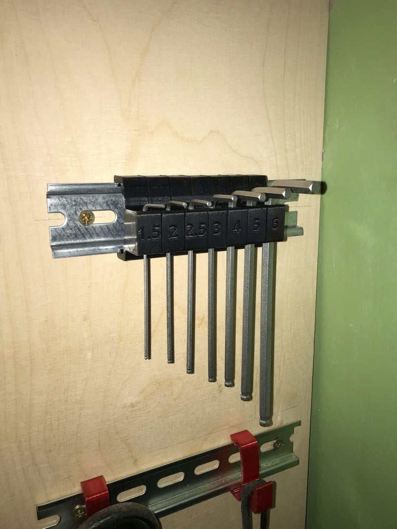 Tool holders for DIN rails