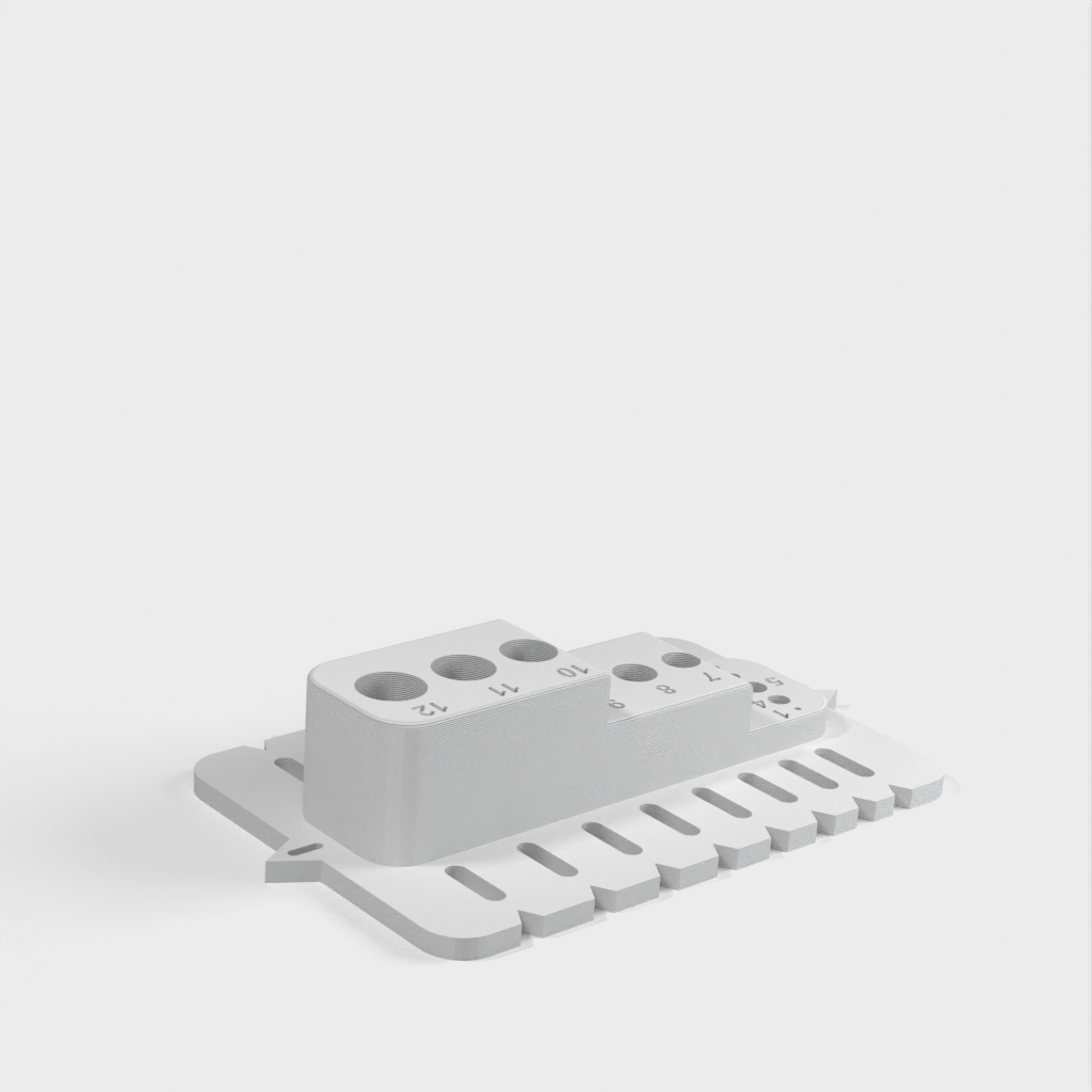 Portable drill guide block with metric holes and adjustment points