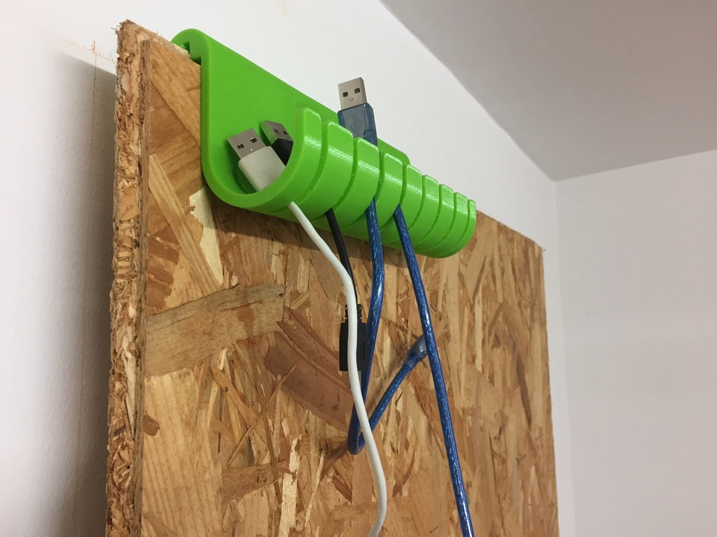 USB cable holder for OSB wood boards