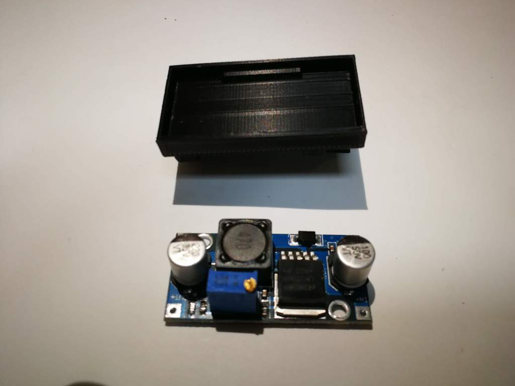 Mounting bracket for DC-DC Converter LM2596 on DIN rail