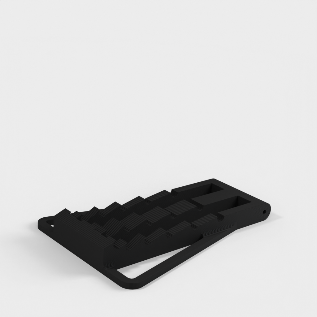 Universal adjustable stand for phones and small tablets