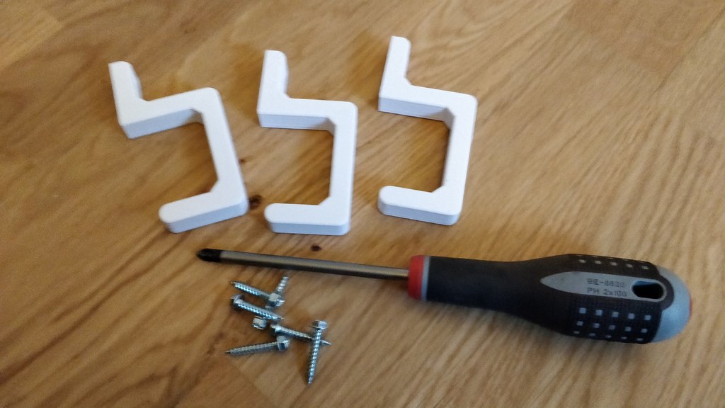 Cable management hook for an organised workspace