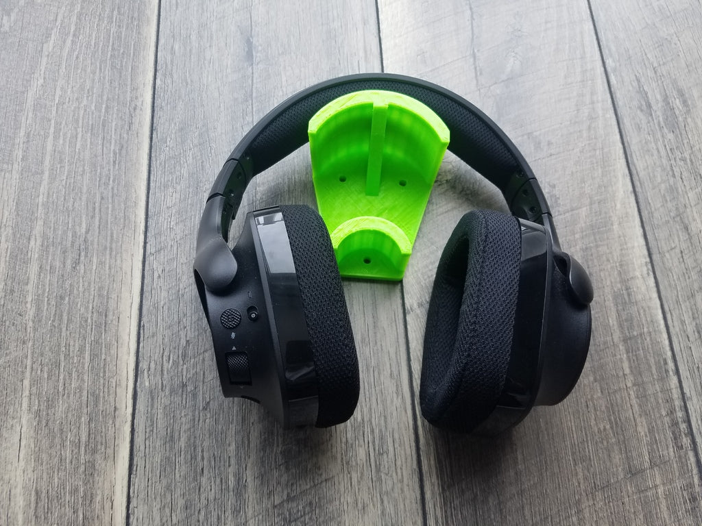 Headphone holder with cable storage