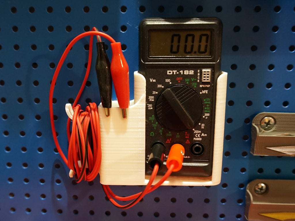 Flexible Multimeter Holder for Wall and Pegboard Mounting