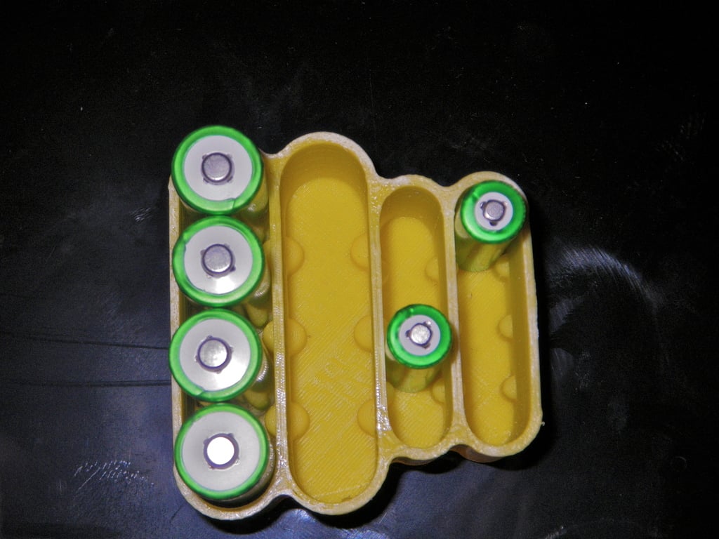 Battery holder for 8 AA and 8 AAA batteries