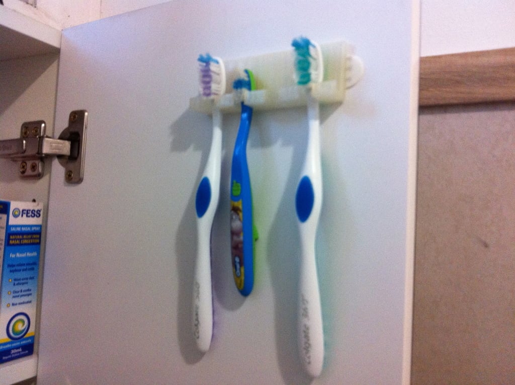 Really simple toothbrush holder for four toothbrushes