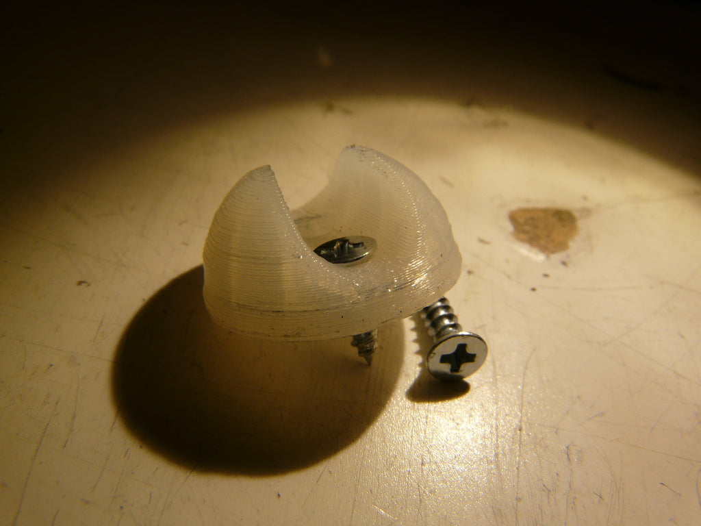 Cable clip with screw holes