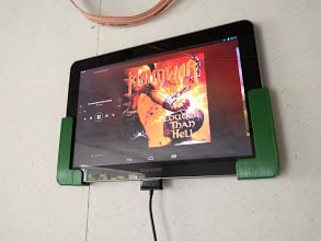 Adjustable universal wall mount for tablet
