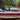 Steering rail for inboard boat engine cover