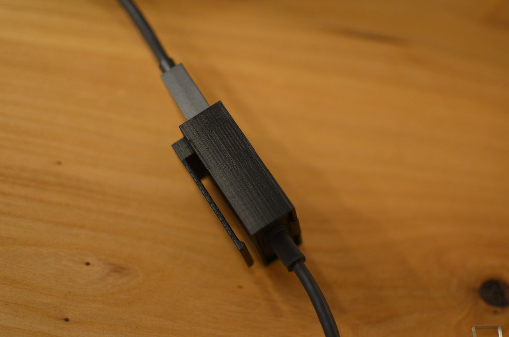 Belt clip for Playstation VR cable