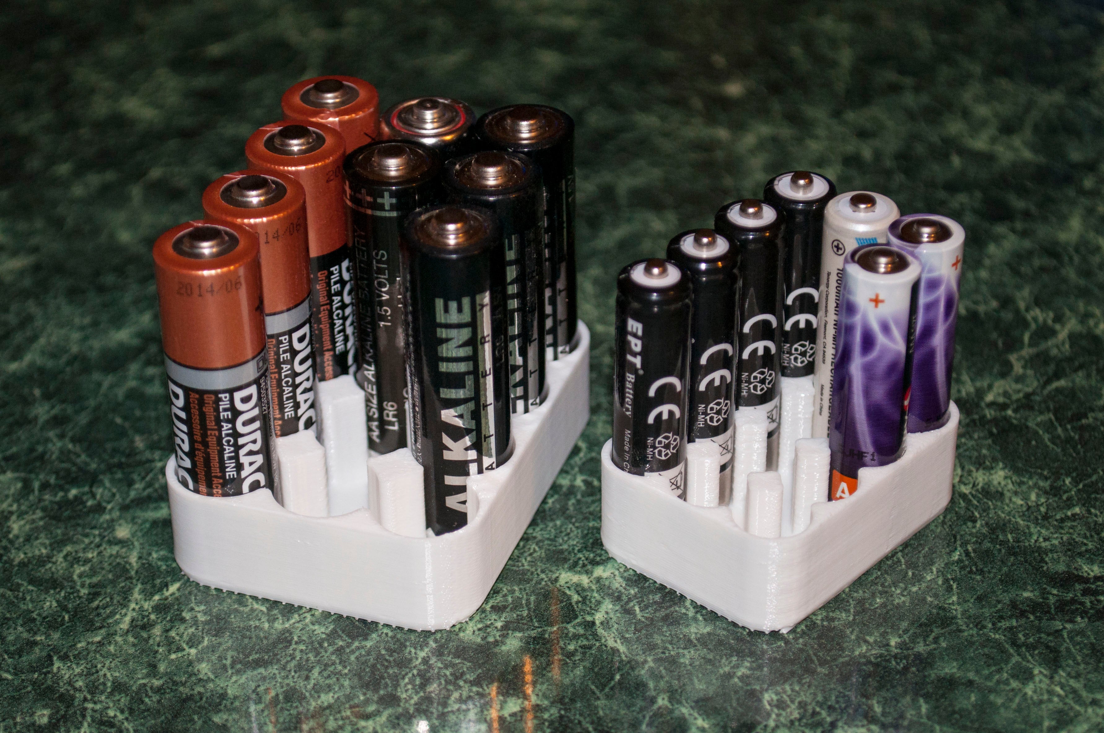 Battery holder for AA, AAA and 18650 batteries