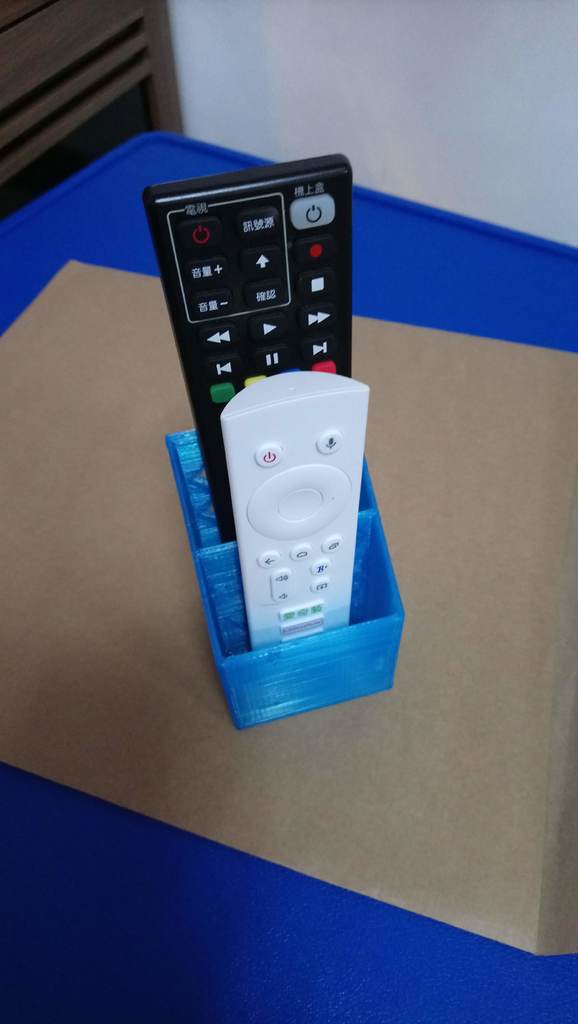 Magnetic remote control holder for TV