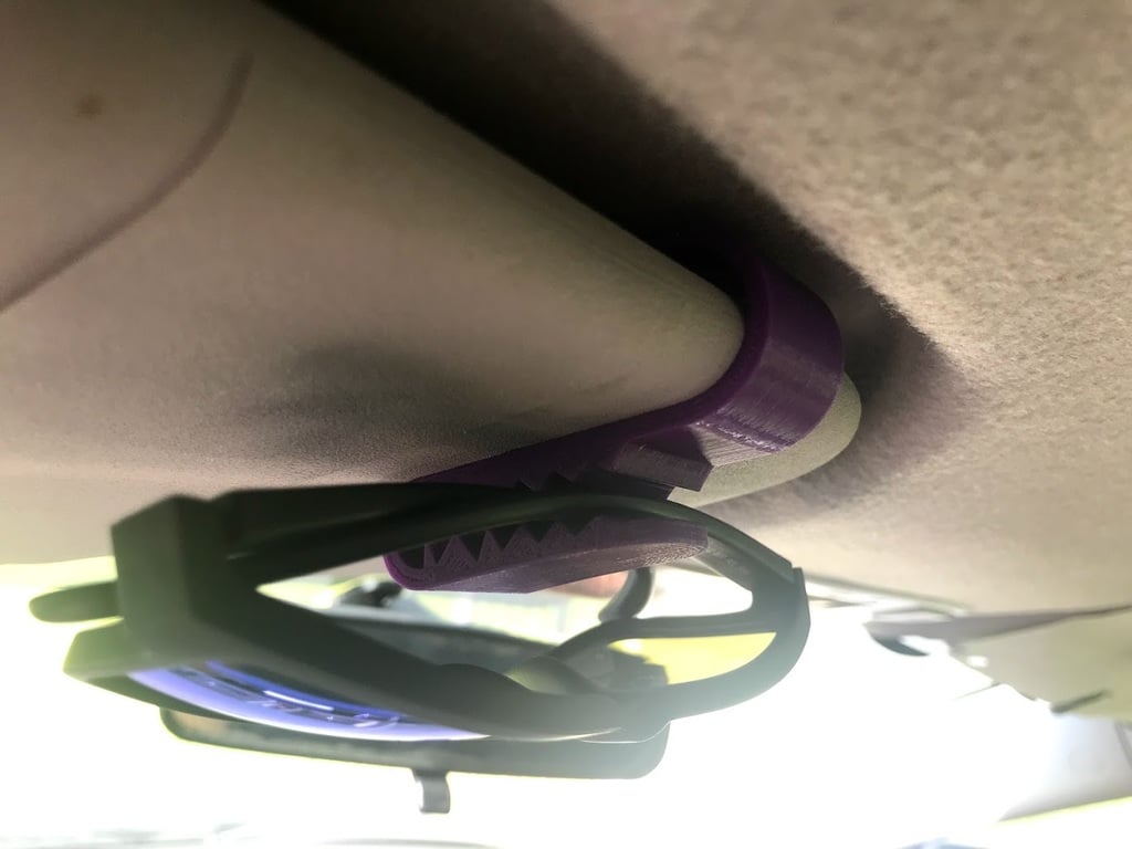 Sunglasses holder for the car sun visor