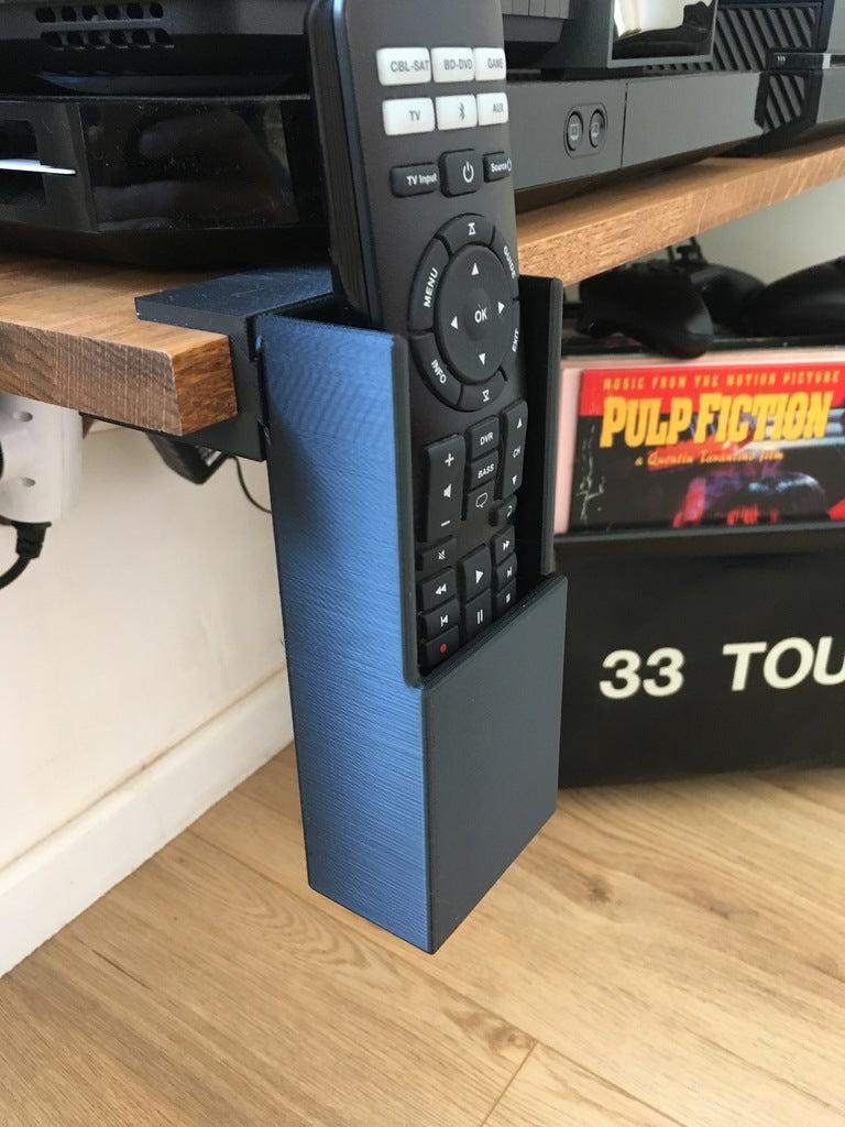 Remote control holder for 19mm shelf unit