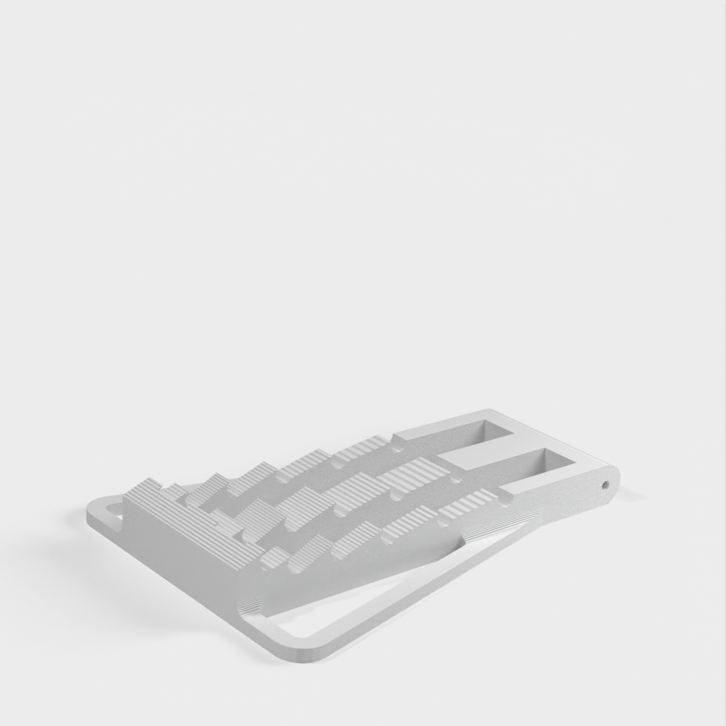 Universal adjustable stand for phones and small tablets