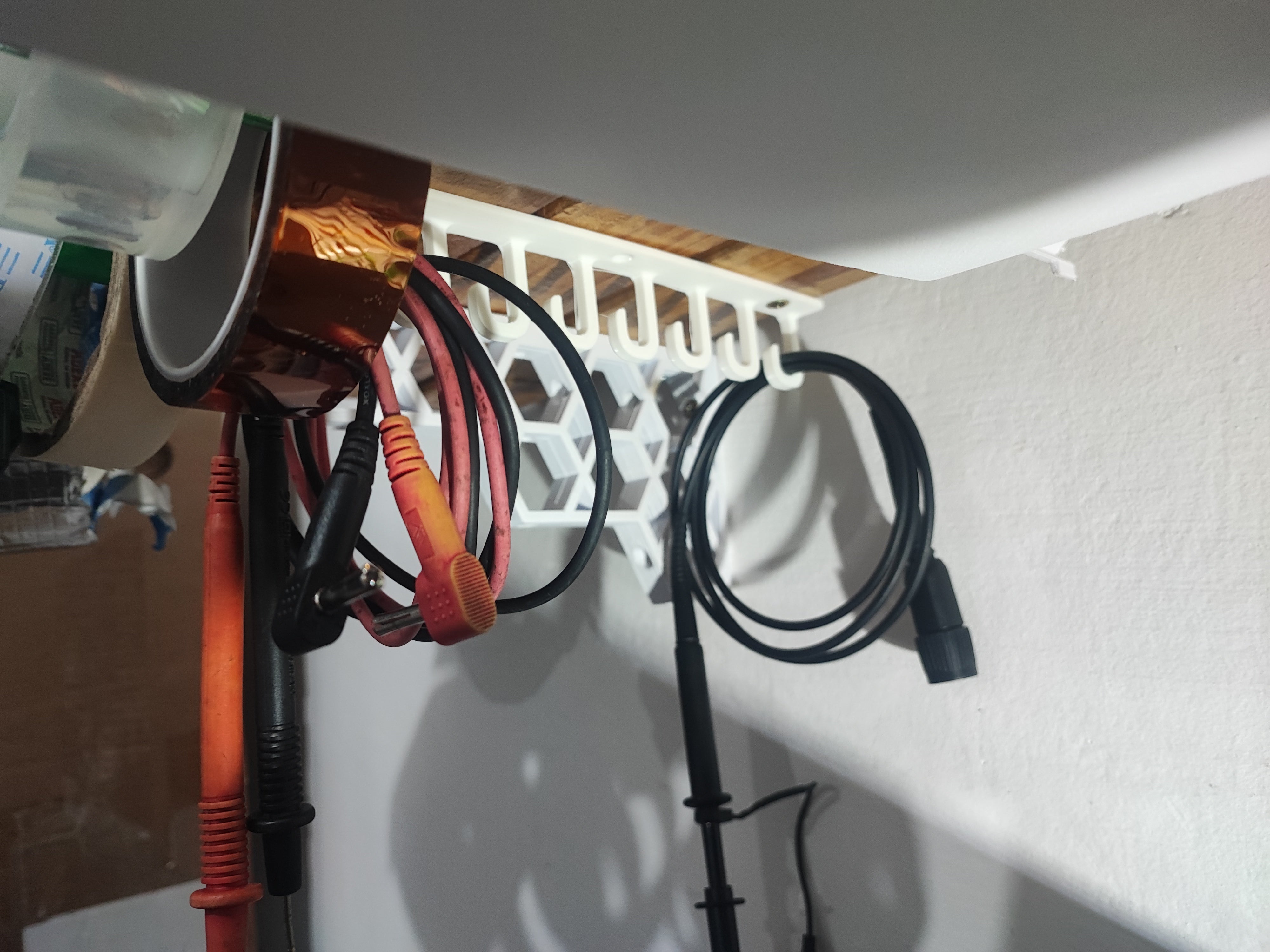 Under shelf cable hangers / hooks