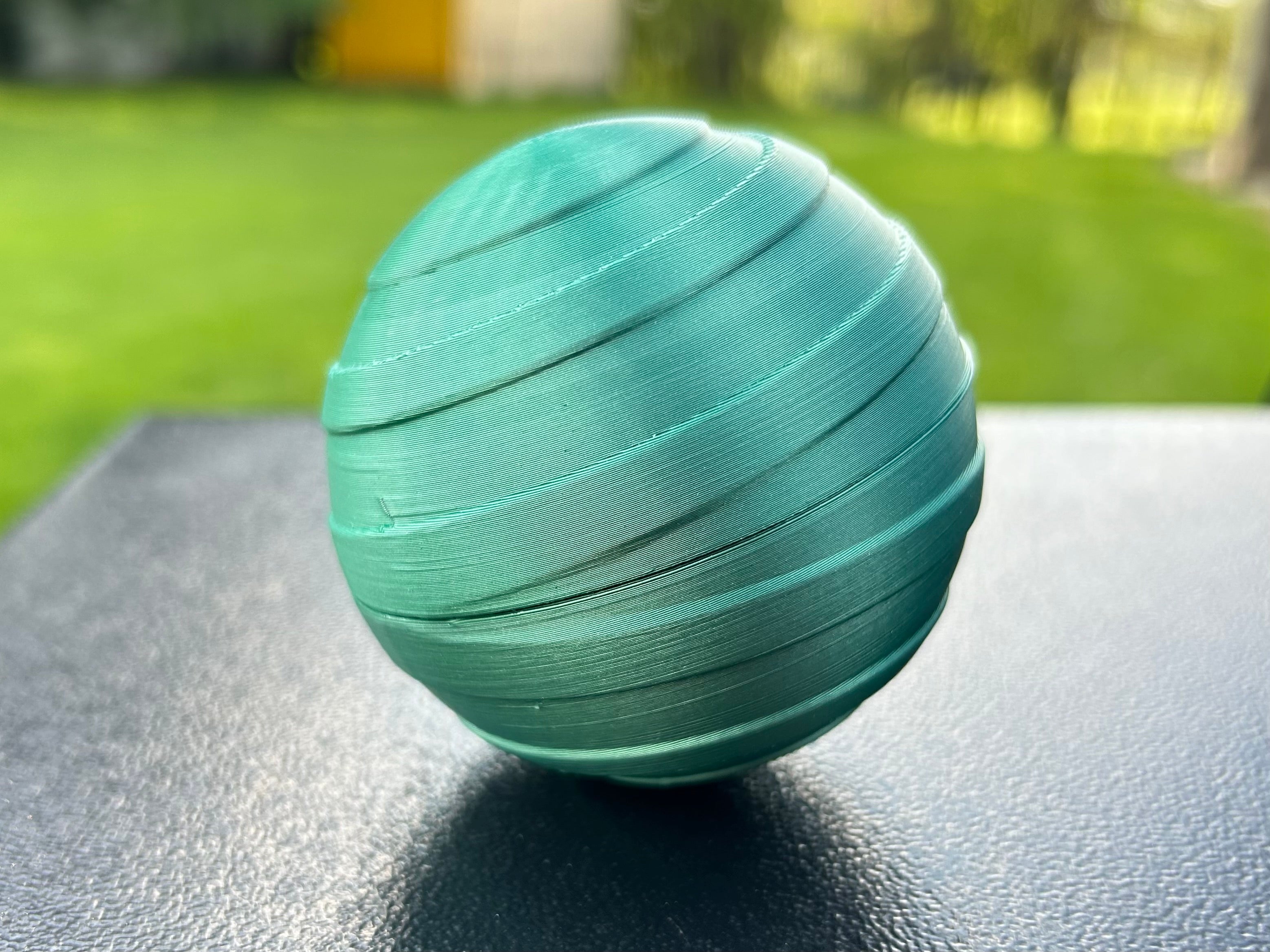 Threaded Sphere Container - Storage container in spherical design