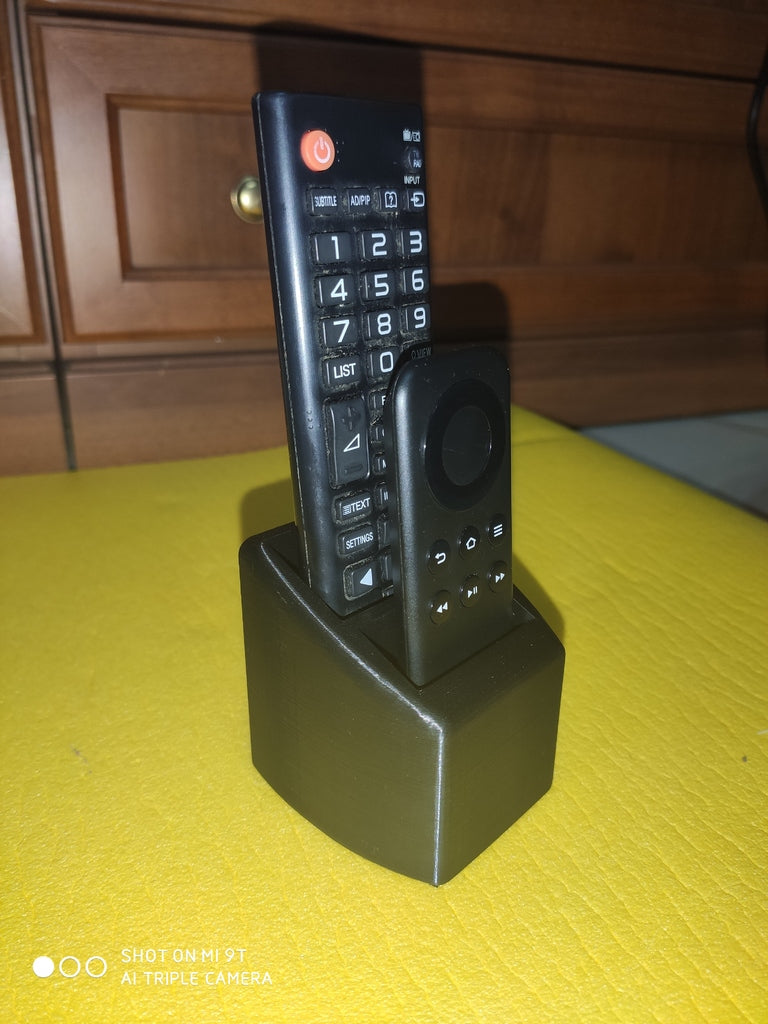 Remote control holder with 2 holes