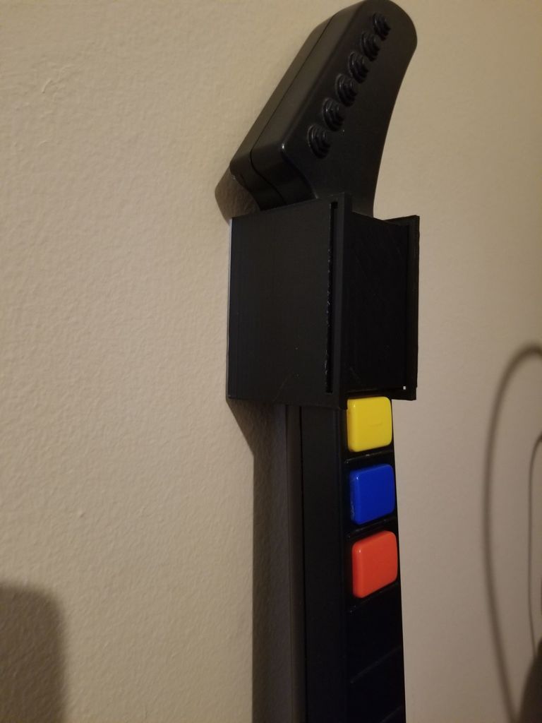 Wall hanger for Guitar Hero Xplorer V2