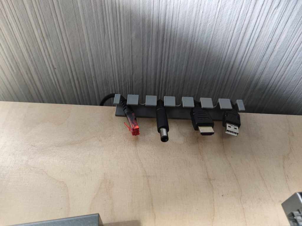 Cable hanger holder