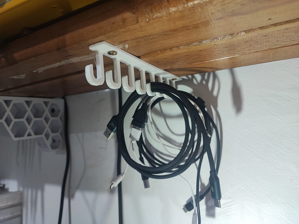 Under shelf cable holder / hook