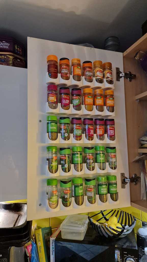 Spice rack for cabinet door