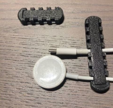 Cable holder for bedside table