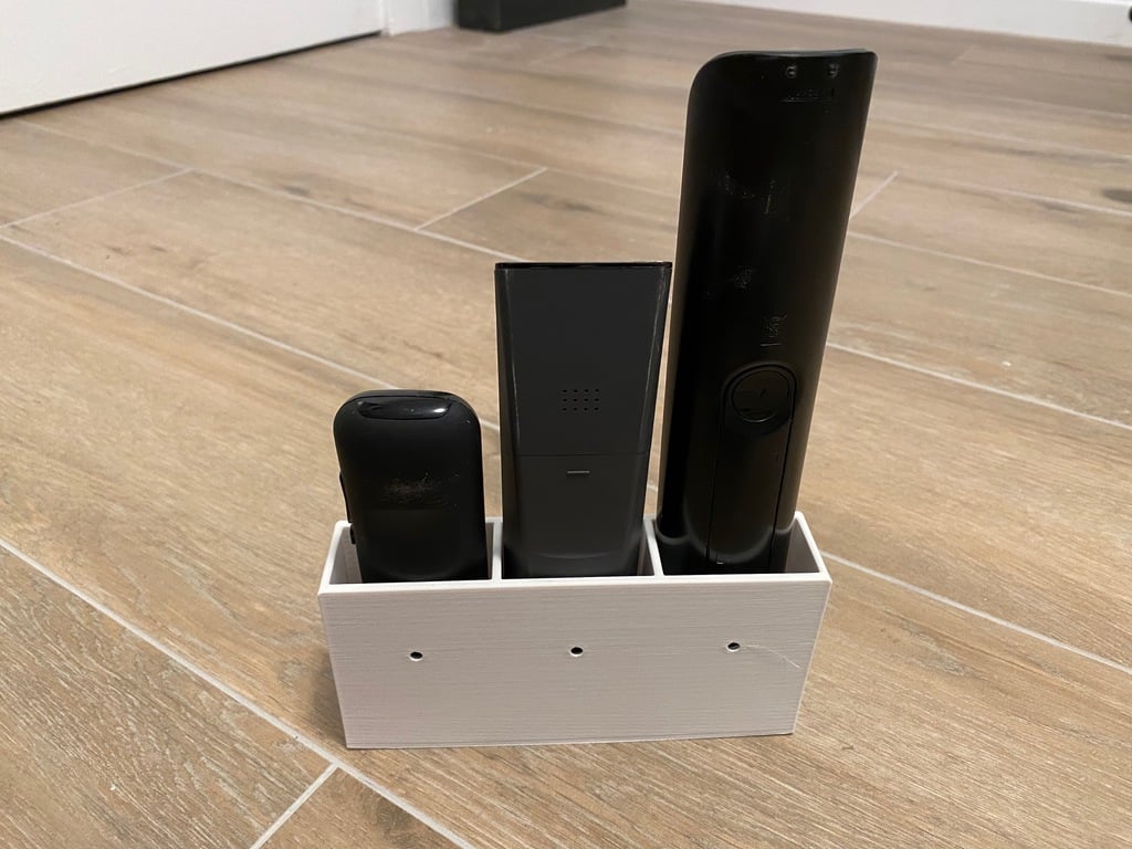 Wall-mountable holder for 3 remote controls