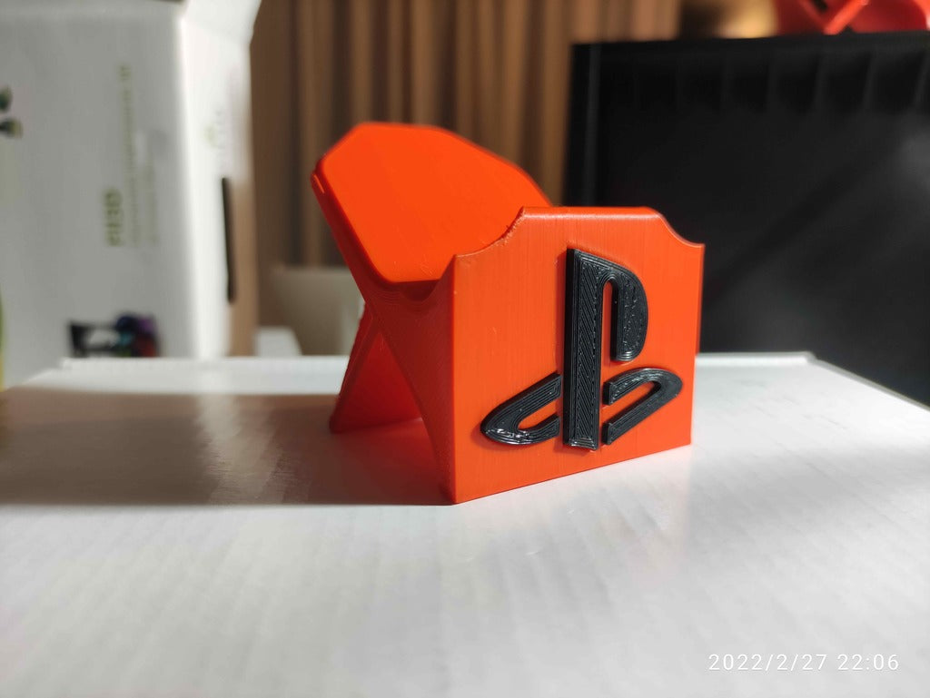 Shelf for Playstation 4 games with adaptive controller support