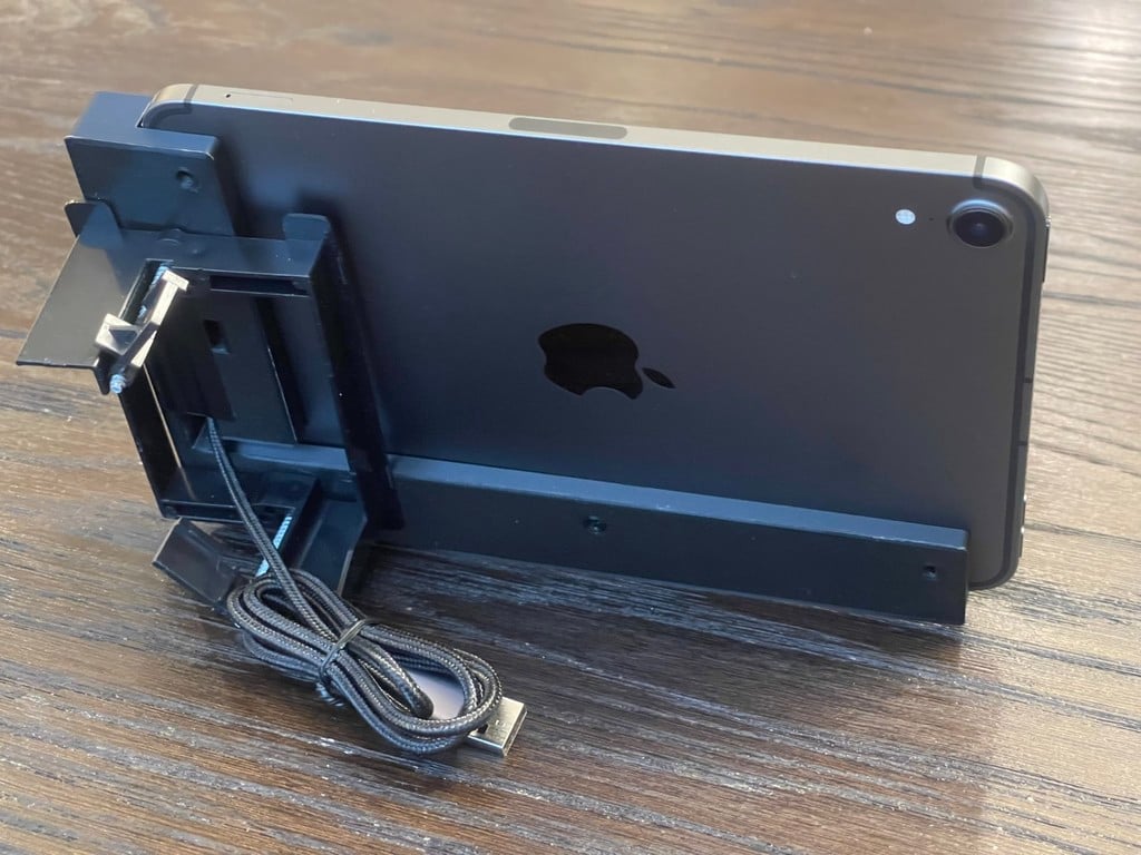 Asymmetric iPad wall mount with charging function and removable holder