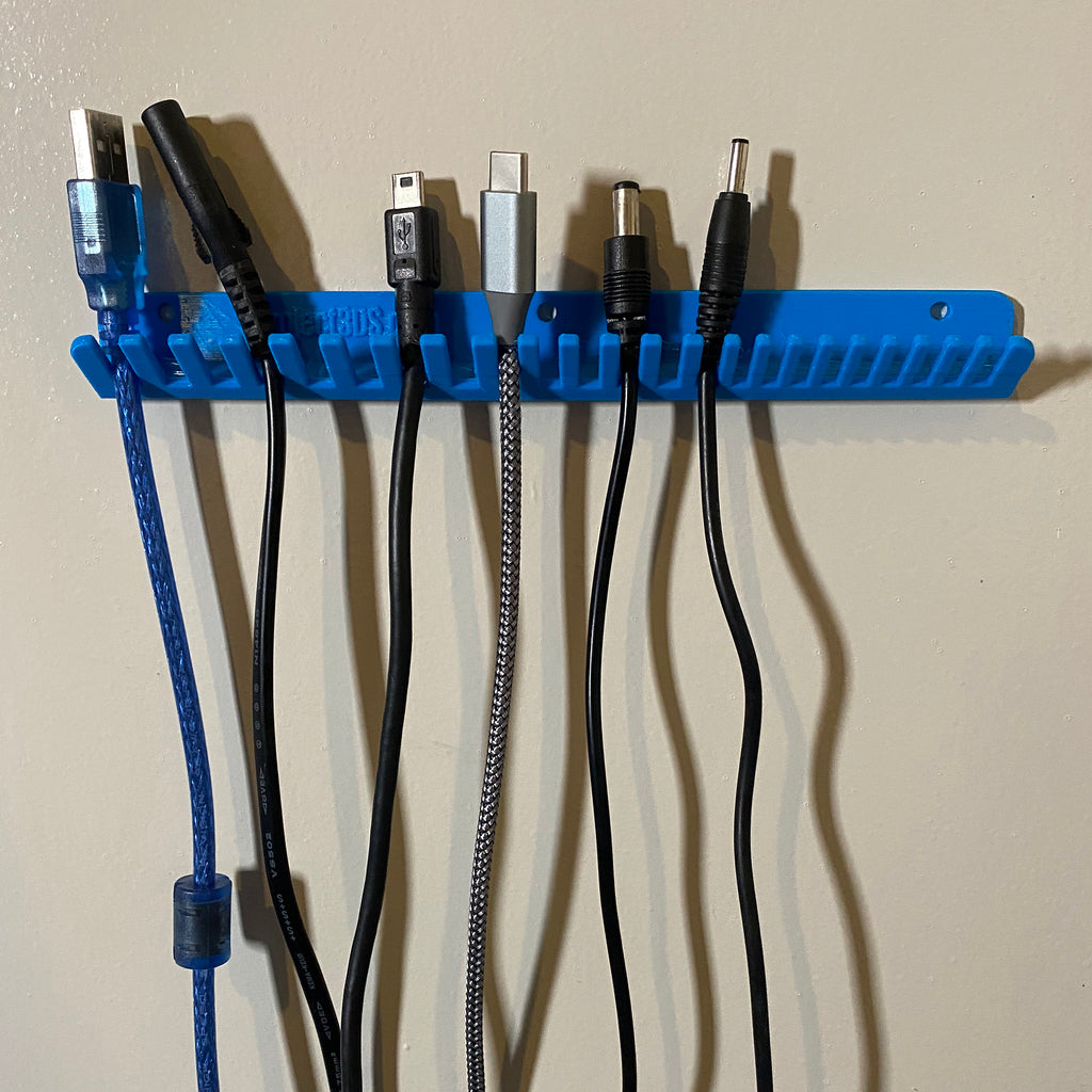 Simple cable holder for wall mounting