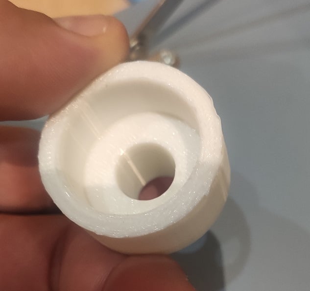 Reducer for outlet of boat pump