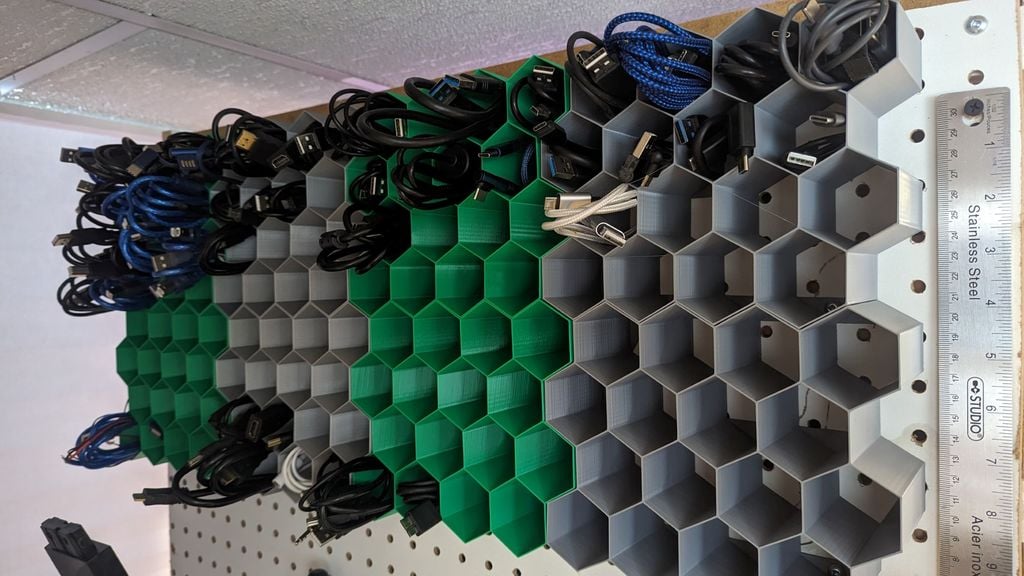 Cable holder for the wall