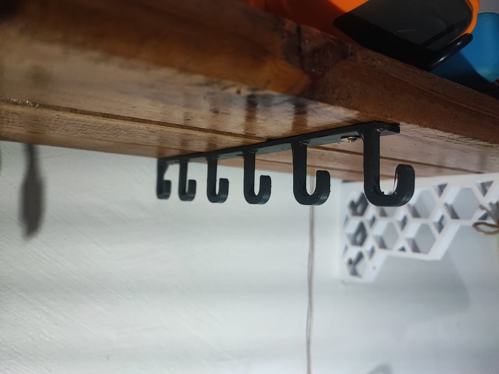 Under shelf cable holder / hook