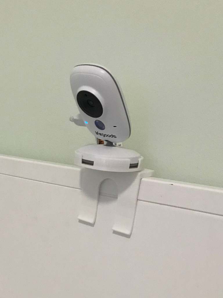Camera mount for baby monitor with offset hole