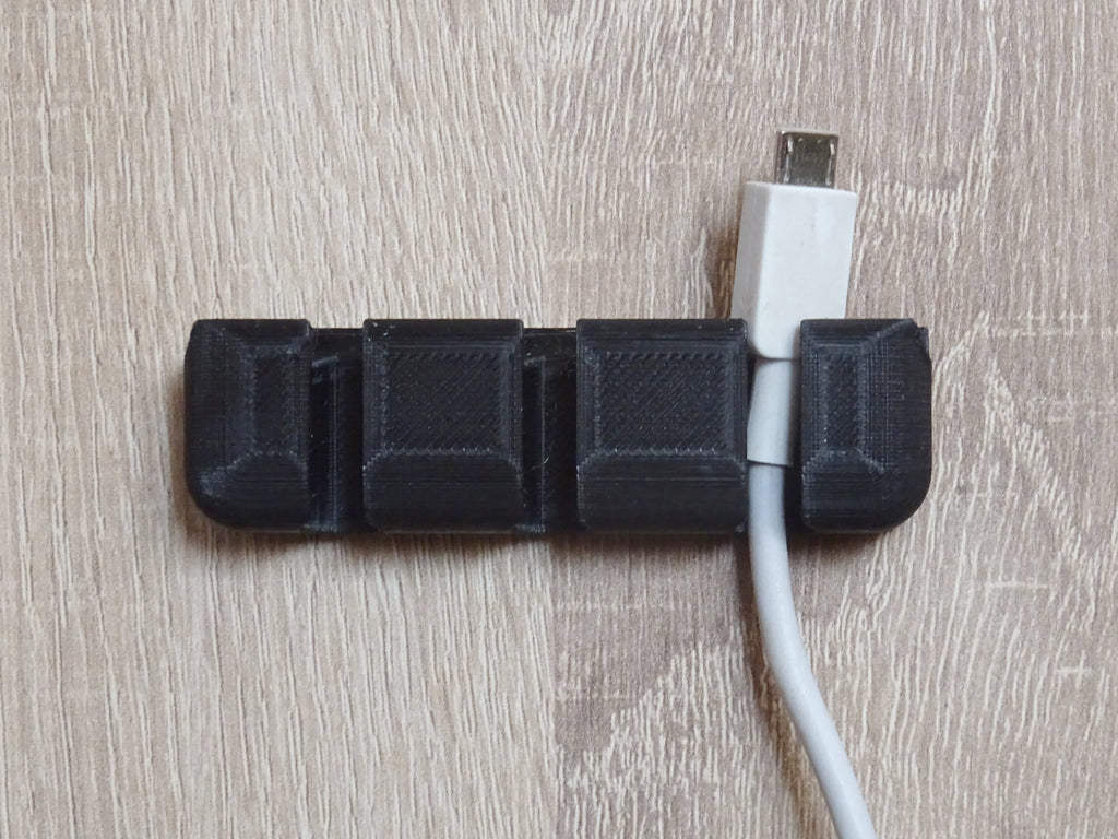 3 × USB cable holder for mounting with double-sided adhesive tape