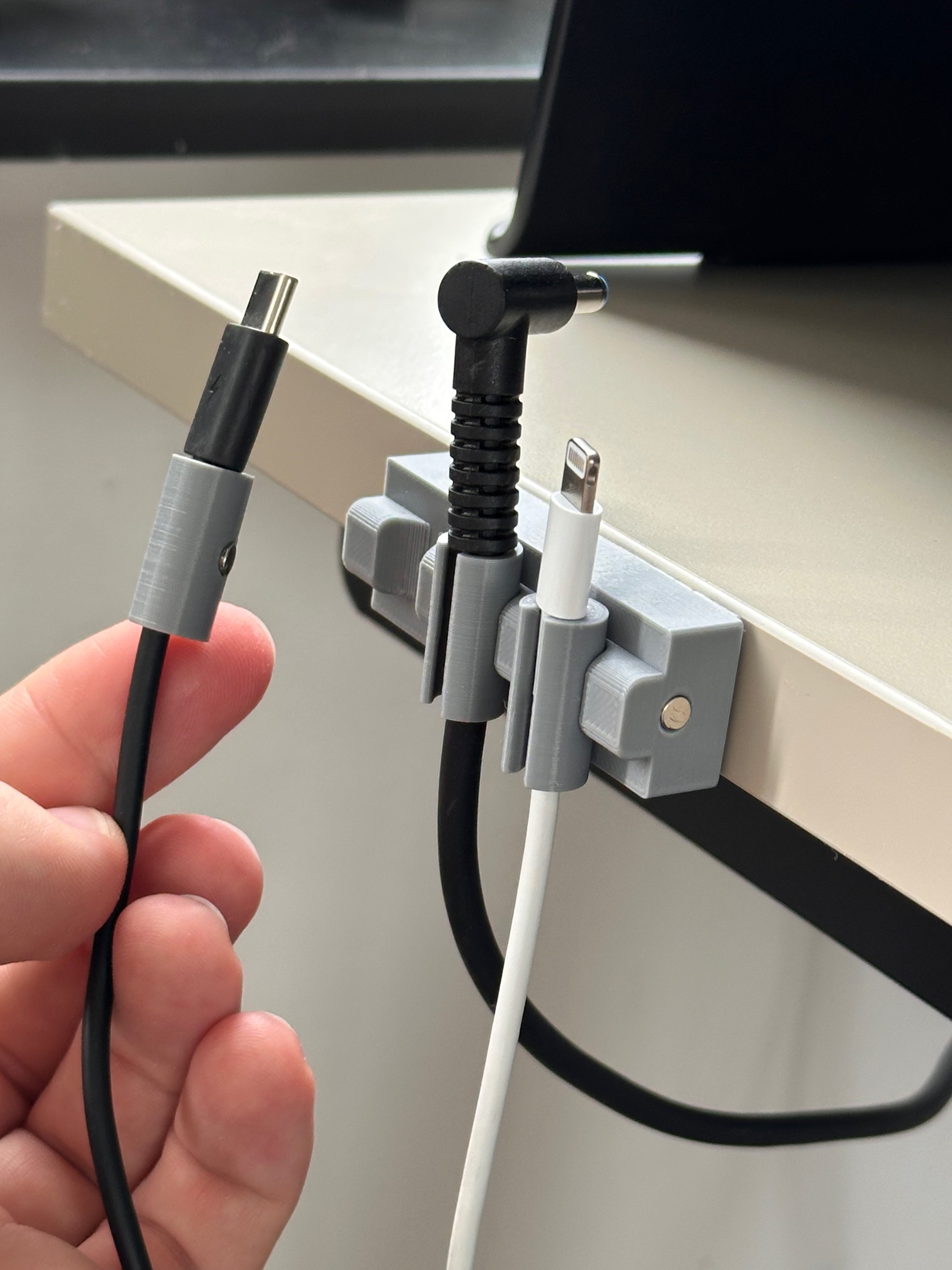 Magnetic cord holder