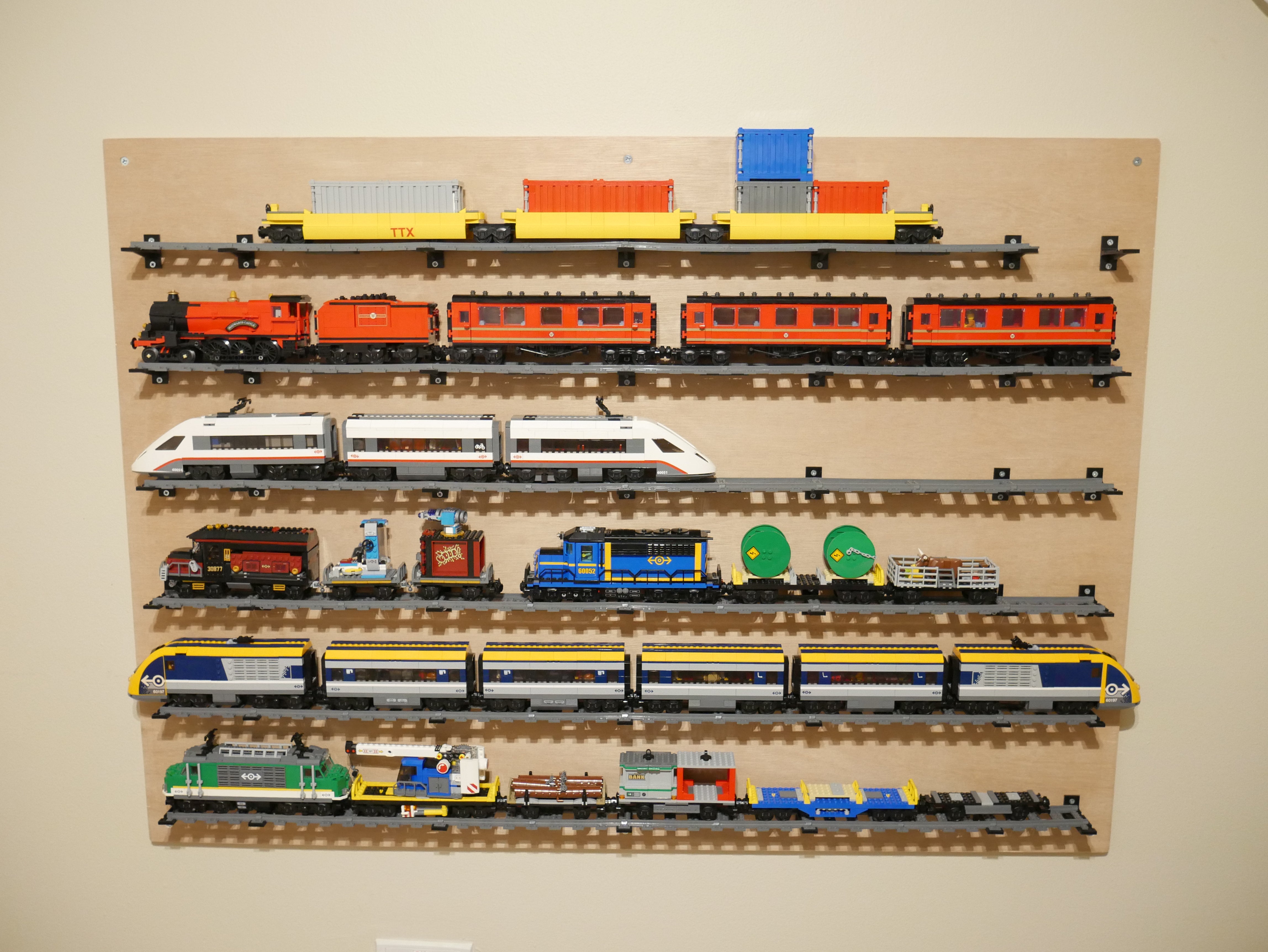 Wall mount for LEGO train tracks