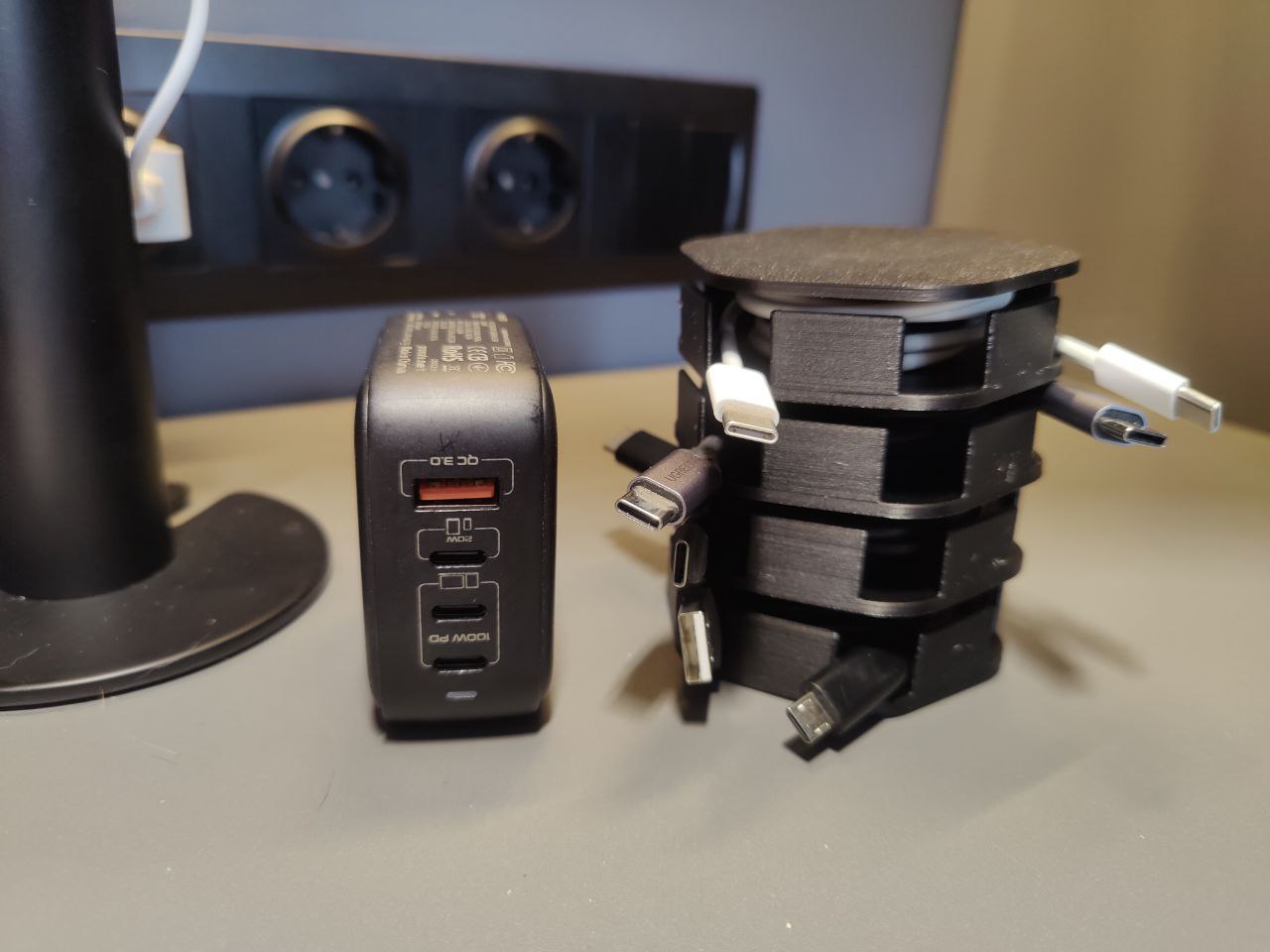 Modular holder for charging cables