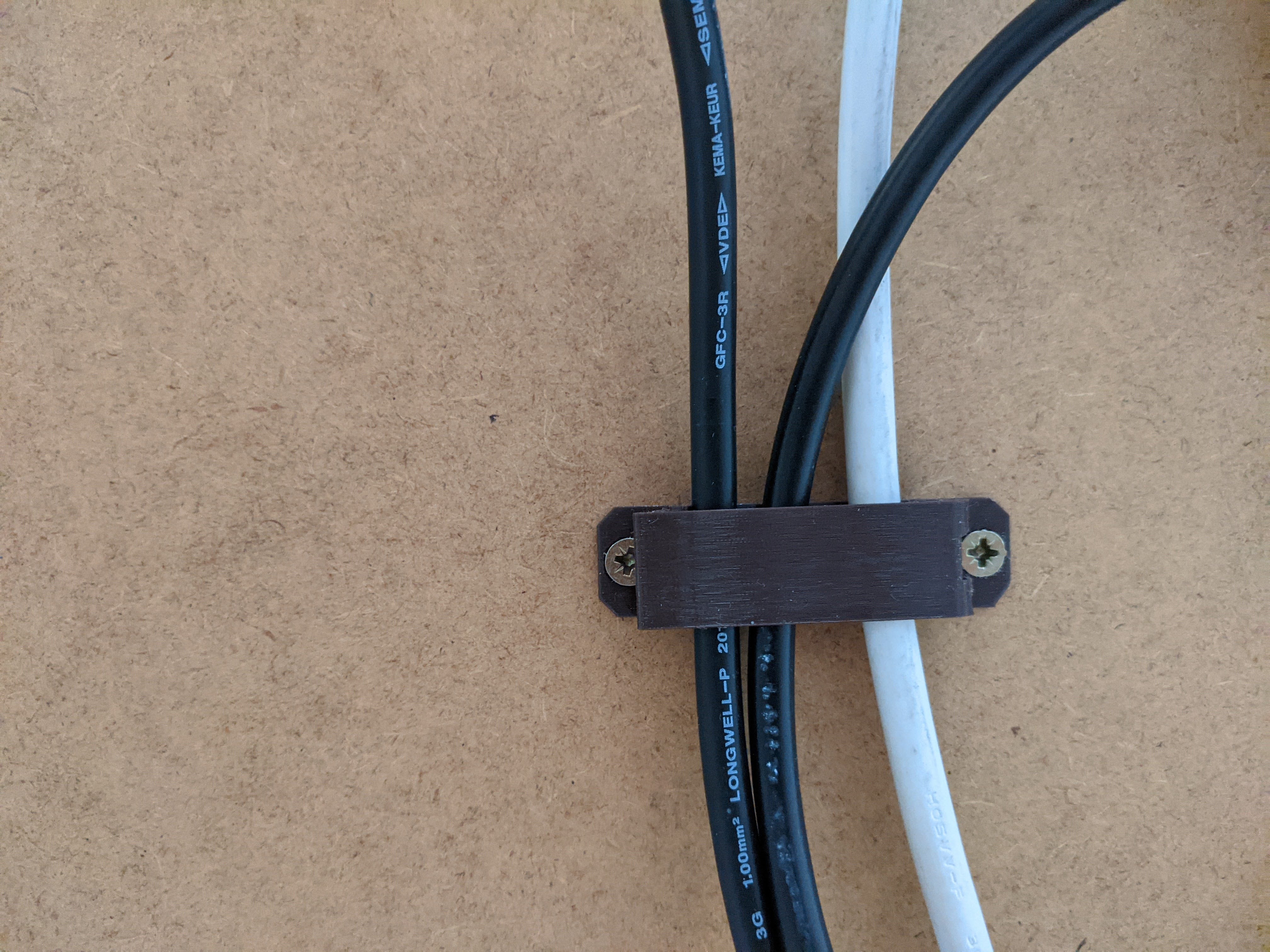 Cable management clip with hinge