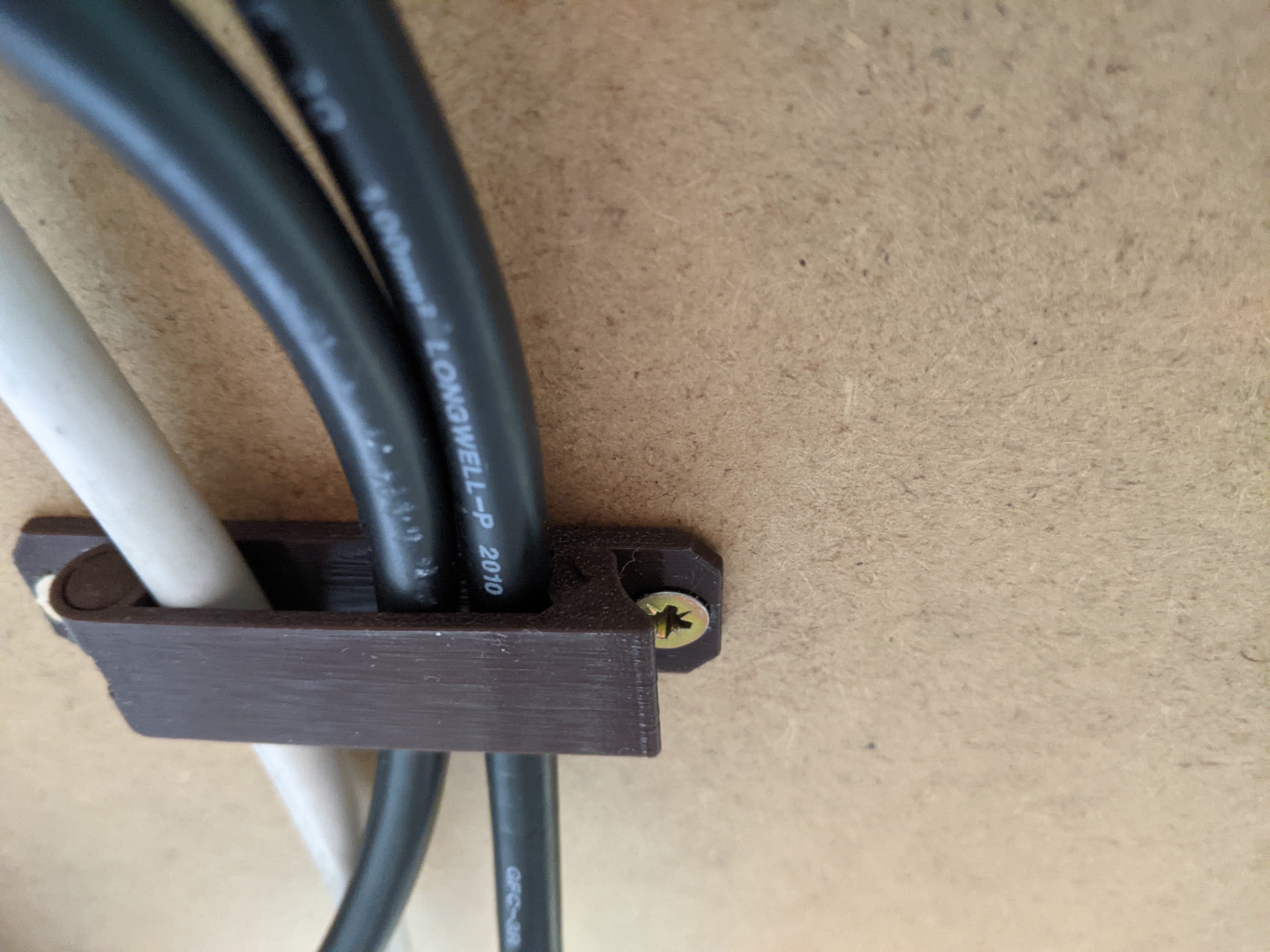 Cable management clip with hinge