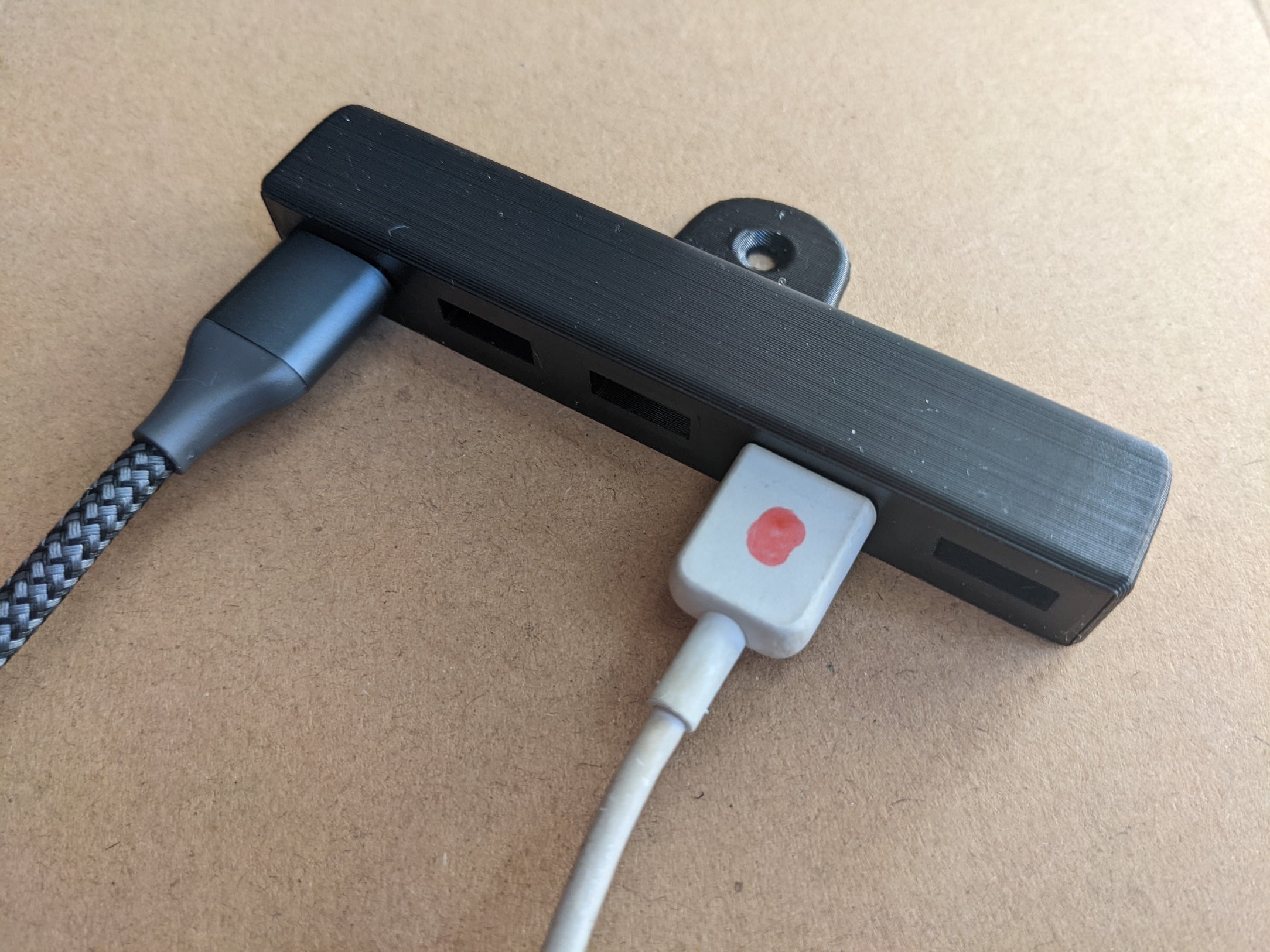 Wall holder for USB cables with 5 slots
