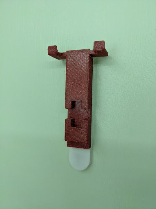Command-Strip Wall Mount for OpenRC F1 Car
