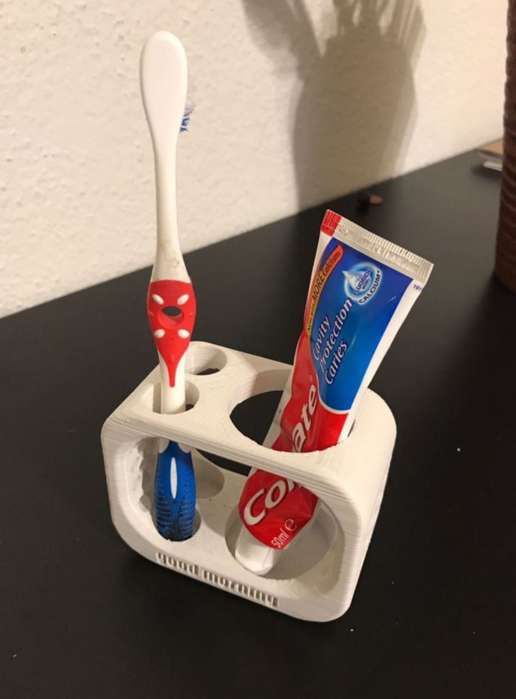 Toothbrush and Toothpaste Holder for Two Toothbrushes