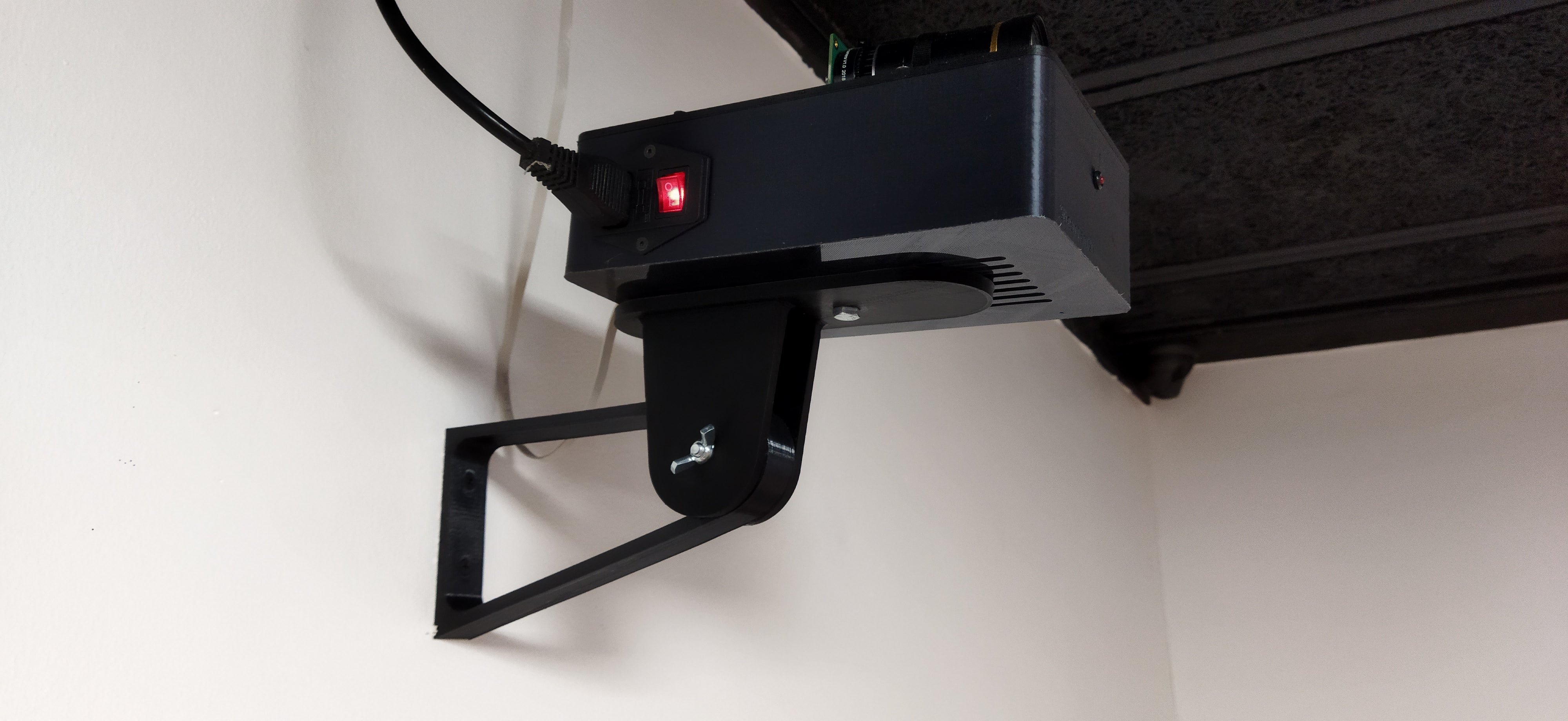 Pan and tilt camera wall mount